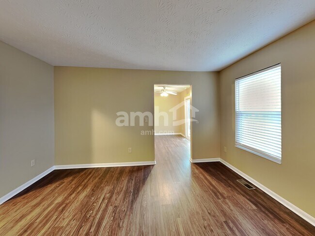 Building Photo - 6312 Satin Wood Dr