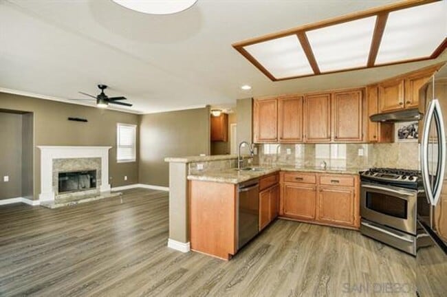 Building Photo - Beautifully Remodeled Home with outdoor Kitchen and Spa!
