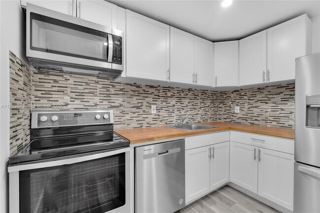 Building Photo - 6920 Harding Ave