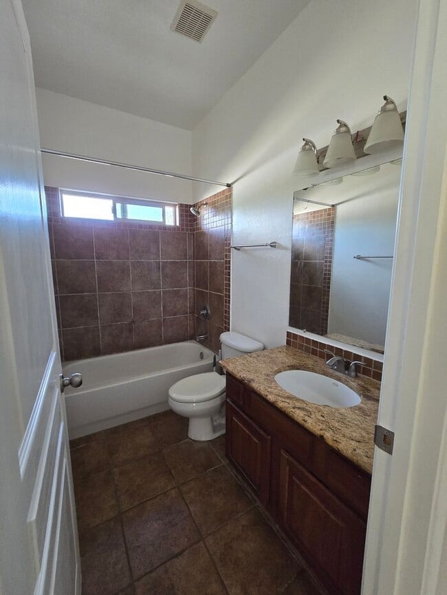 Building Photo - Spacious East Side Oasis – 4 Bed, 2 Bath Home with Premium Upgrades!