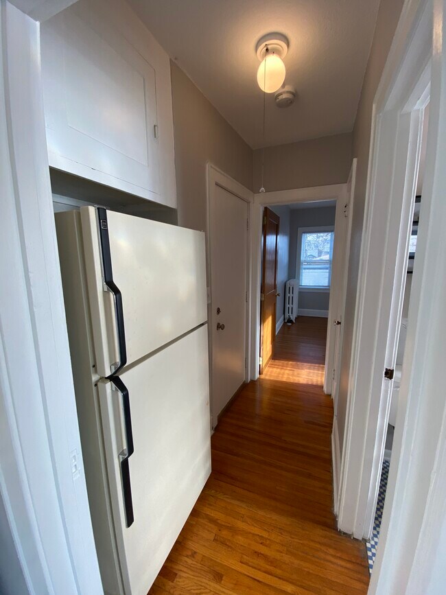 Hallway off kitchen leading to bedroom - 4247 Cedar Ave S
