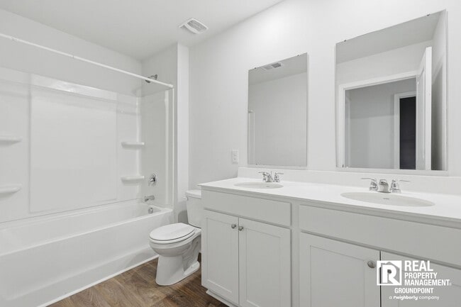 Building Photo - 4 Bedroom Rental in Cane Bay Plantation with Open Layout and Pond View