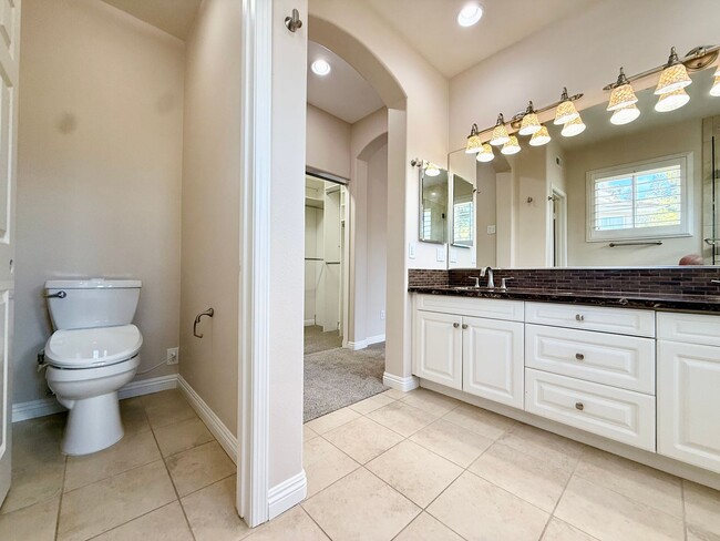 Building Photo - Gated 4 Bedroom 3 1/2 Bath Two Story Home