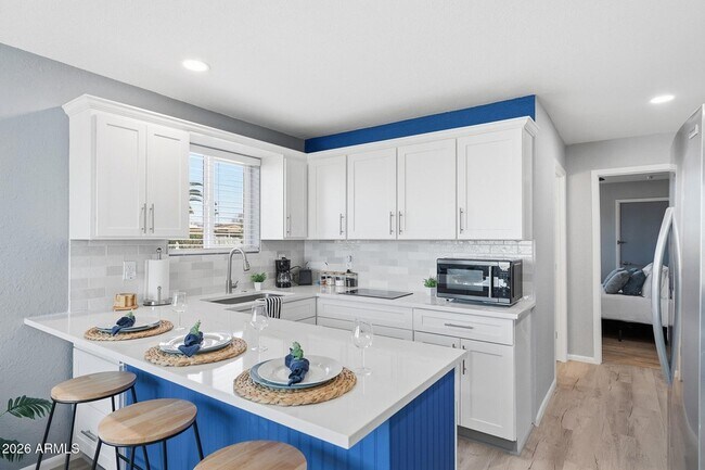 Building Photo - 11210 W Pueblo Ct
