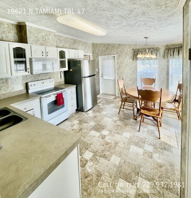 Building Photo - 19621 N Tamiami Trl
