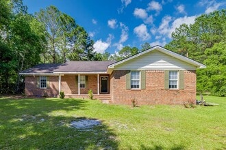 Building Photo - Private 3BR Brick Home on 3+ Acres with Partially Fenced Yard