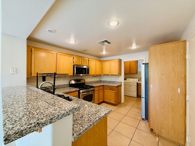 Building Photo - Immaculate and Inviting Two-Story Condo in Lone Mountain Available! 1/2 OFF THE FIRST FULL MONTH'...