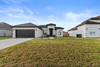 Building Photo - NOW AVAILABLE - 4BD/2BTH/2GAR HOME AT BROO...