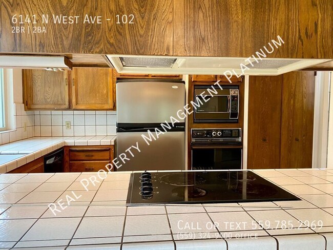 Building Photo - $1,950 Bullard & West, 2 Bed Condo, Commun...