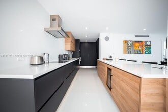 Building Photo - 5600 Collins Ave