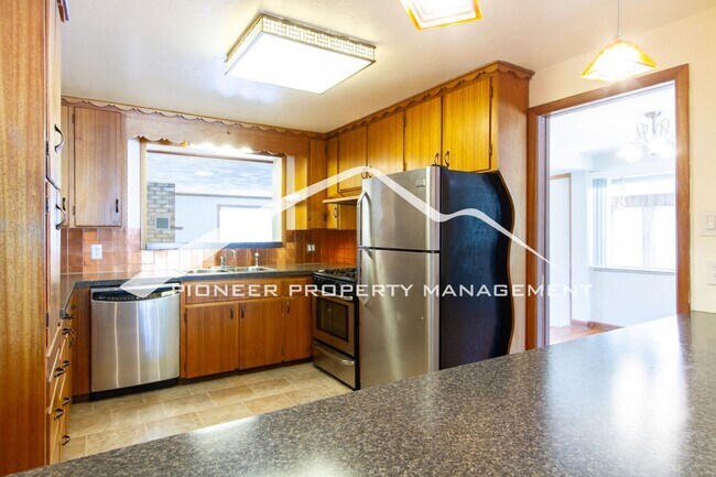 Building Photo - Spacious Home on Quiet Street with 2 Car Garage and Central A/C