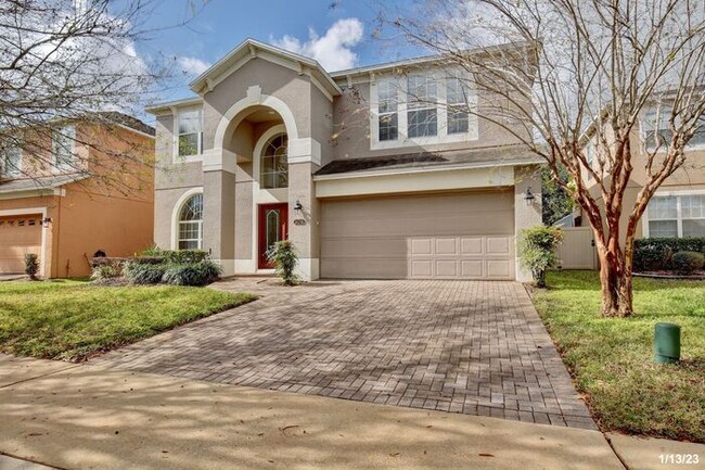 Building Photo - Stunning 4/2.5 Home with a Large Fenced Ba...