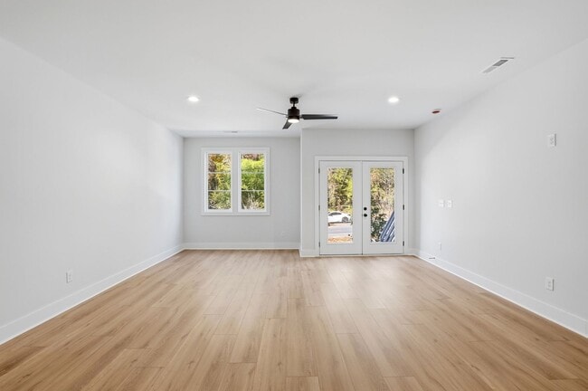 Building Photo - Bright, Open & Exceptionally Large—Your Ideal 2-Story Townhome