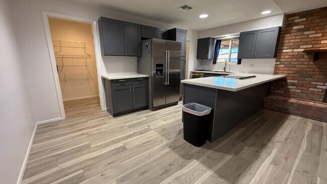 Building Photo - Beautiful Updated Kitchen ,  Large Backyard with Large Covered Patio