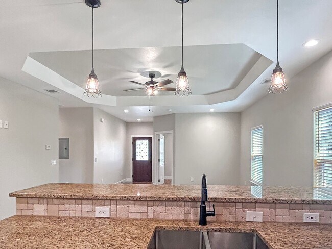 Building Photo - Elegant Stone-Front Home on 1 Acre in Natalia