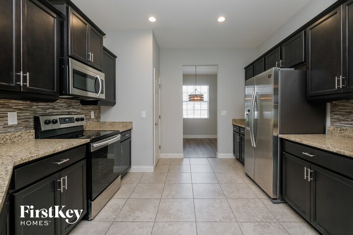 Building Photo - 5812 Valentino Way