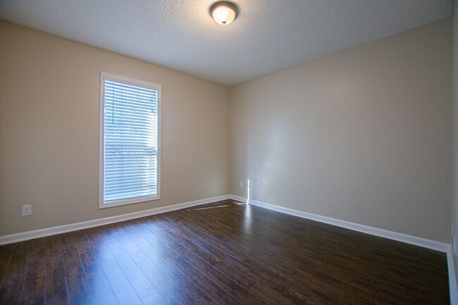 Building Photo - Pet Friendly Three Bedroom with Bonus!