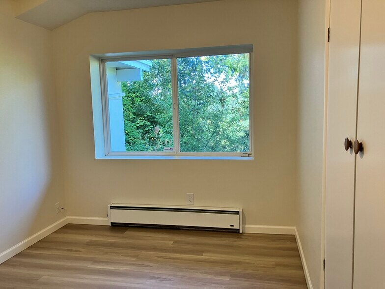 Bedroom with large window - 3022 SW 12th Ave