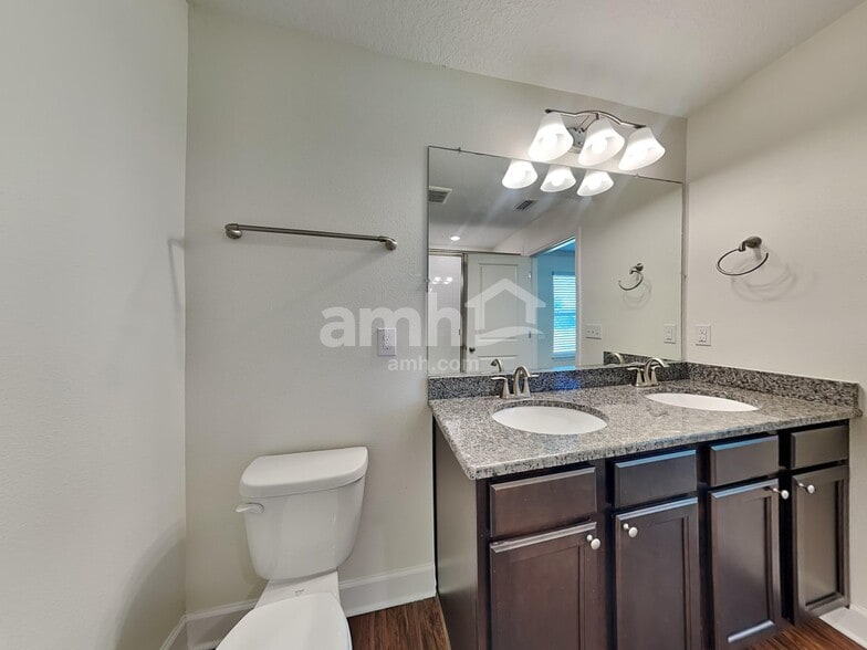Building Photo - 6605 Hidden Rose Pl