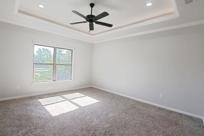 Building Photo - Tour Today! Beautiful 4-Bedroom, 2-Bathroom Home Overlooking a Pond!