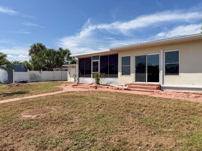 Building Photo - RENT THIS CANAL FRONT HOME WITH ZERO DEPOSIT DOWN