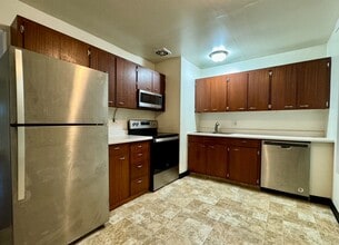 Building Photo - Reed Neighborhood Gem~ Great Natural Light~ Fenced Front Patio~ Onsite Laundry~ Off Street parkin...