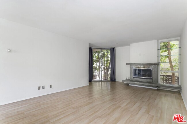 Building Photo - 1230 N Sweetzer Ave