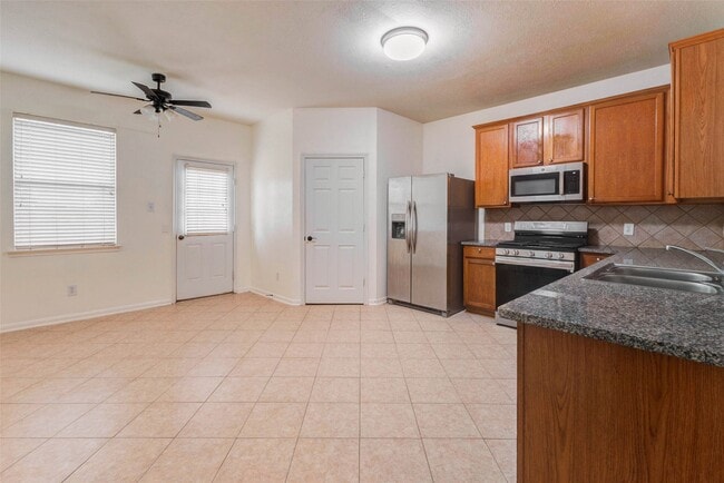 Building Photo - 7434 Jacobs Well Dr