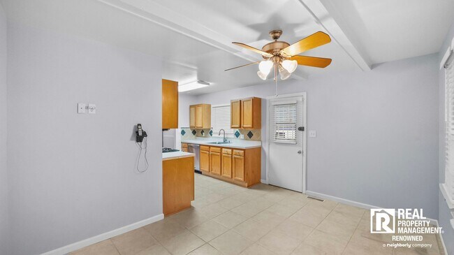 Building Photo - Lovely 4 BR/2.5 BA Split-level in Quite Ne...