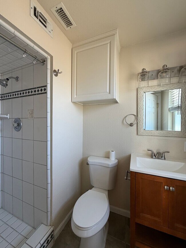 Building Photo - 3 Bedroom 2 Bathroom House with Central A/C , 2 Car Garage and Beautiful Backyard with Covered Patio