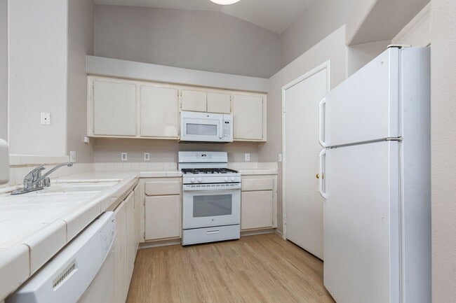 Building Photo - Two bedroom with two car garage in gated c...