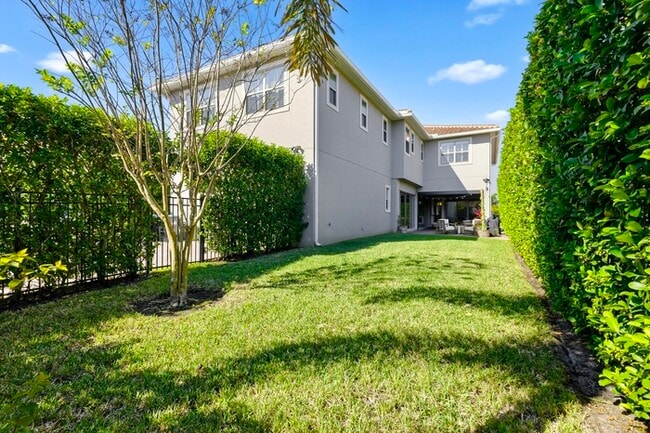 Building Photo - Luxury 5-Bedroom Residence in Eagle Creek with Indoor-Outdoor Living