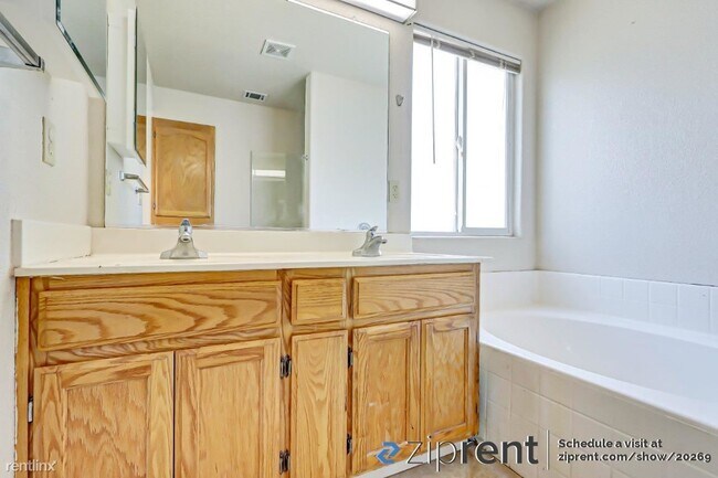 Building Photo - 5 br, 3 bath House - 1003 Sun Meadow Drive...