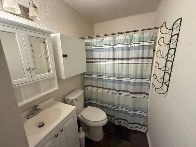 Building Photo - 3 bed 2 bath in Edmond Schools, trendy exterior, hard surface flooring and a fenced yard!  Call u...