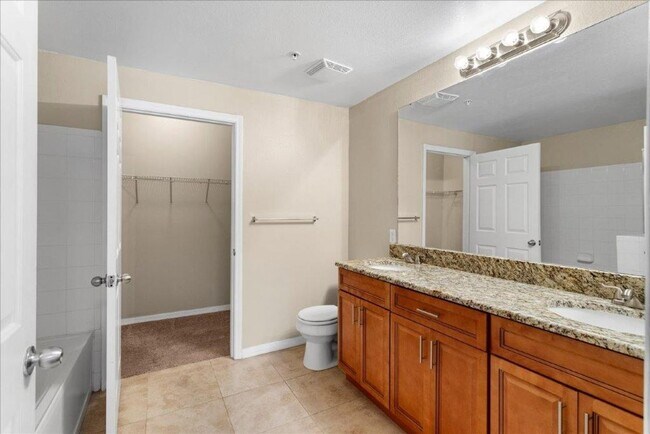 Building Photo - Charming End-Unit Condo in Gated Bordeaux Community!