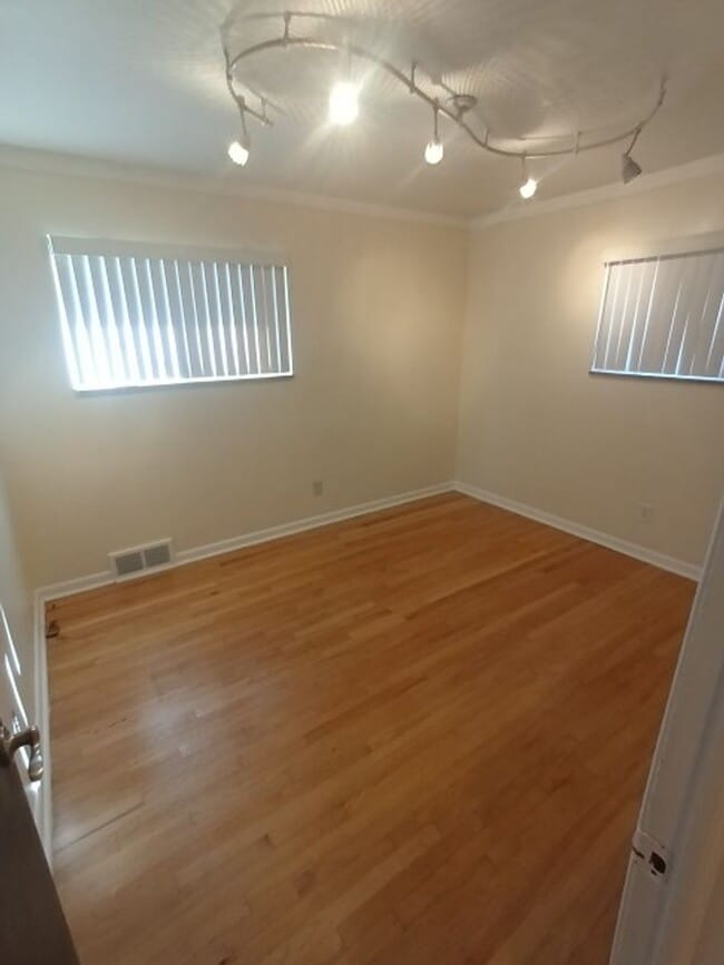 Building Photo - Beautiful, sprawling, brick ranch - $1700/mo
