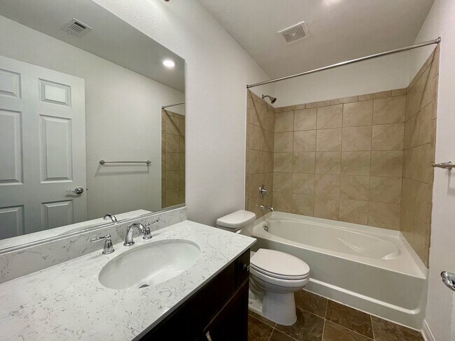 Building Photo - BEAUTIFUL 5 BED 3.5 BATH 3 FLOORS 2 CAR GARAGE SINGLE FAMILY HOME W/ LARGE LOFT & BACKYARD FOR RENT!