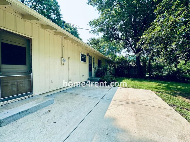 Building Photo - Attractive Prairie Village Ranch w/ FRESH PAINT, Wood Floors, Granite Counters and a Fenced Yard!