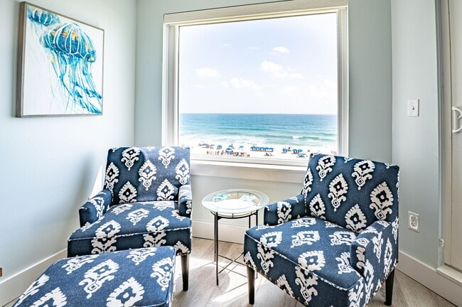 Building Photo - SPEND YOUR OFF-SEASON AT THIS TOP FLOOR OCEANFRONT CONDO