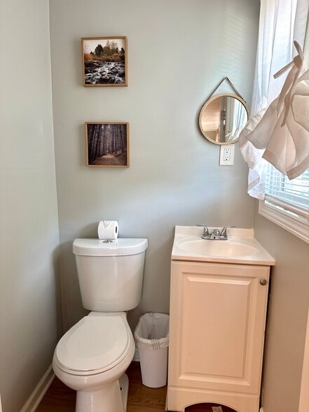Additional half-bath for guests or added convenience. - 1117 Henrietta Dr