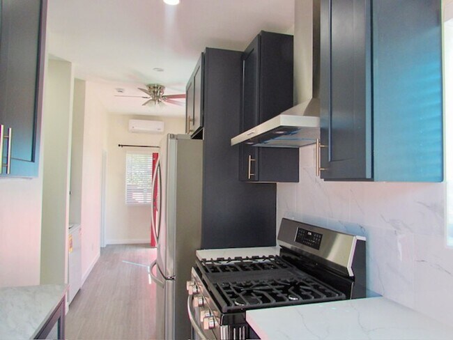 Building Photo - 2bed/1 bath ADU--NEW--Private with wrap around patio/yard Washer/Dryer included!