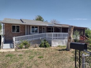 Building Photo - Renovated 5-Bed, 2-Bath Home with Finished...