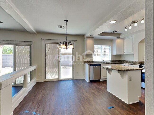 Building Photo - 10749 Artesia Wells St