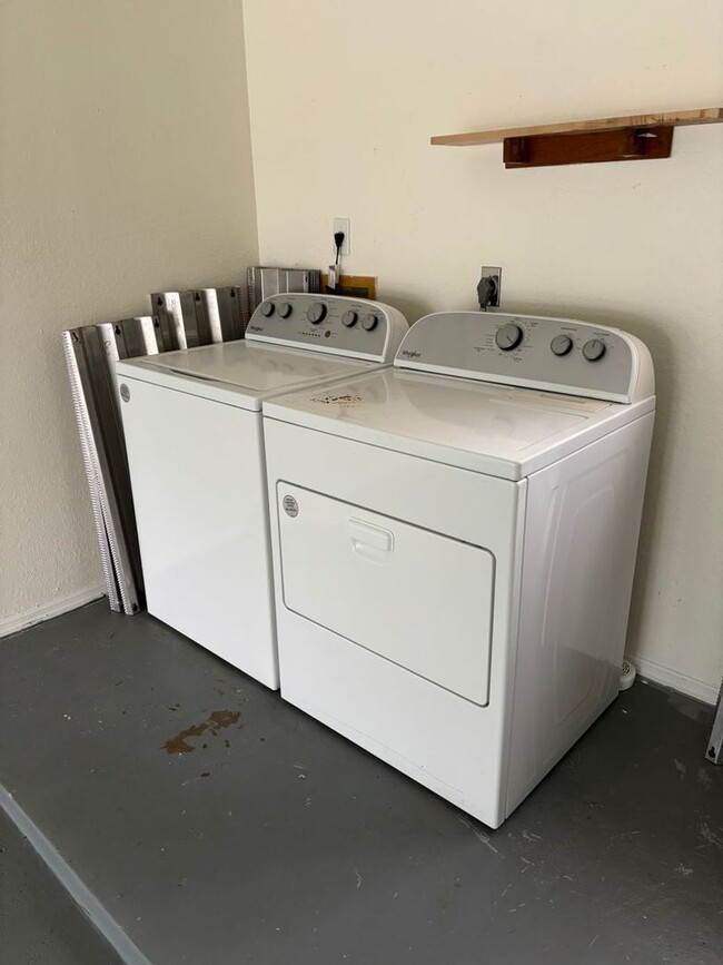 Building Photo - 2/2/1 home with a spacious fenced backyard...