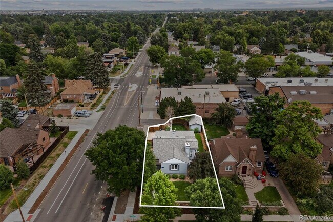 Building Photo - "Spacious 5-Bedroom Gem with Hardwood Floors & Cozy Fireplace in Denver's Heart!"