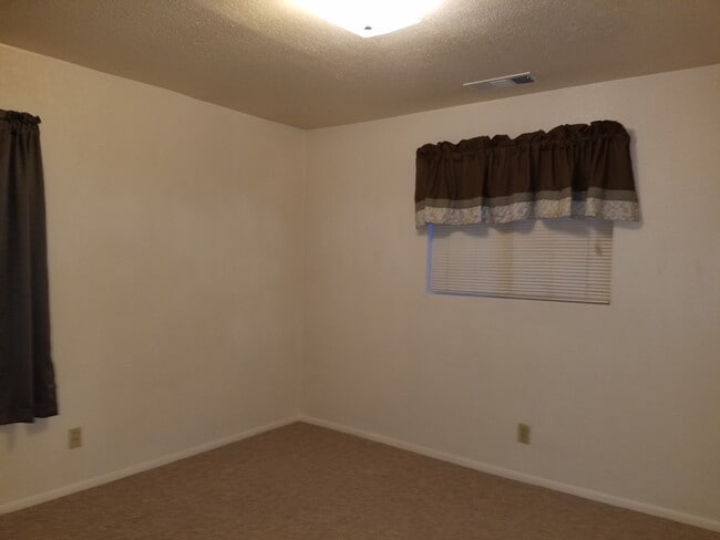 Building Photo - Spacious 2 Bedroom With Carport and Storag...