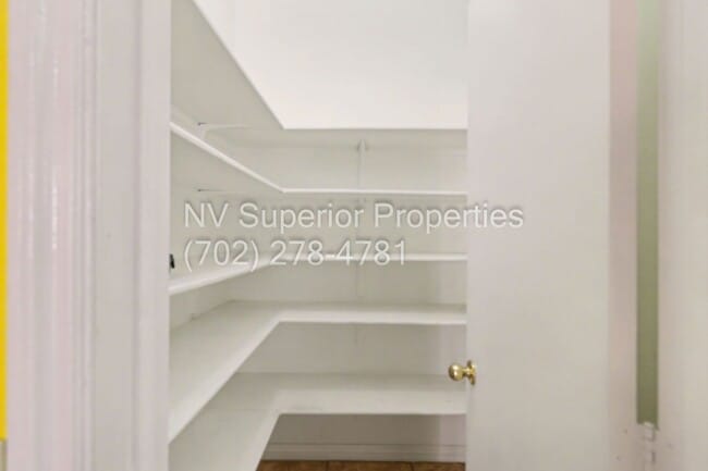 Building Photo - NW!! 4 Bedrooms!!! All Tile and Pergo flooring T/O!! NO Carpet!!! Low Maintenance Desert landscap...