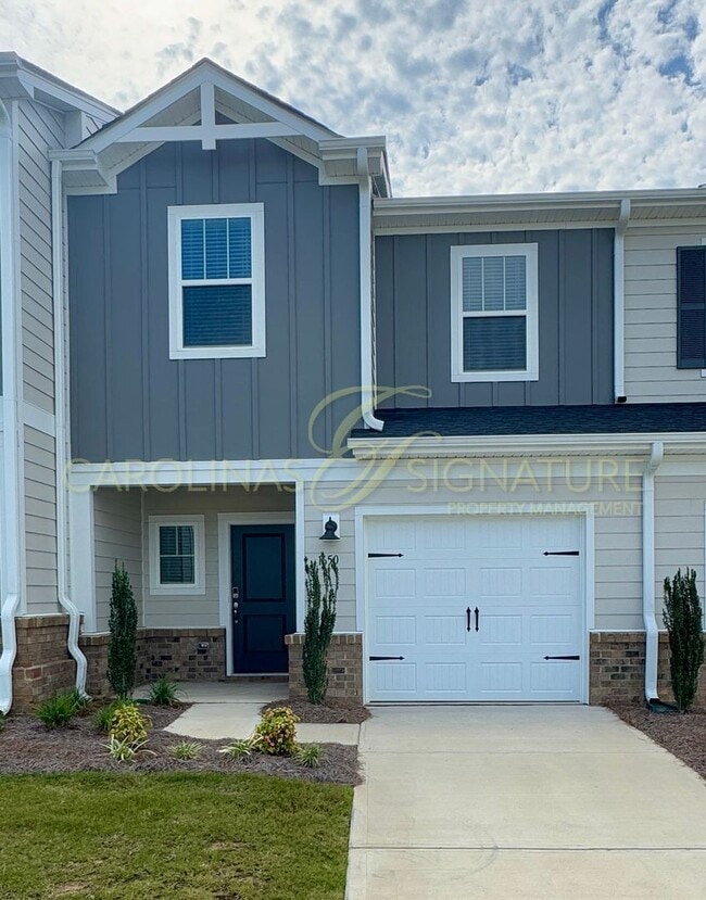 Building Photo - Beautiful New Construction Townhome in Uni...