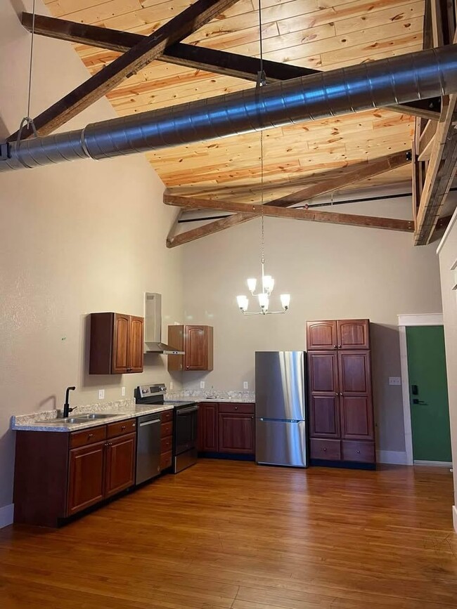 Large kitchen with garbage disposal, under cabinet lighting, dishwasher. - 211 E Water St