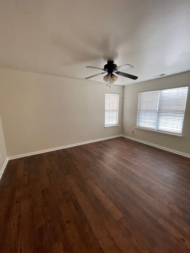 Building Photo - Must see this 4 bedroom 2.5 bath townhouse with 1 car garage .